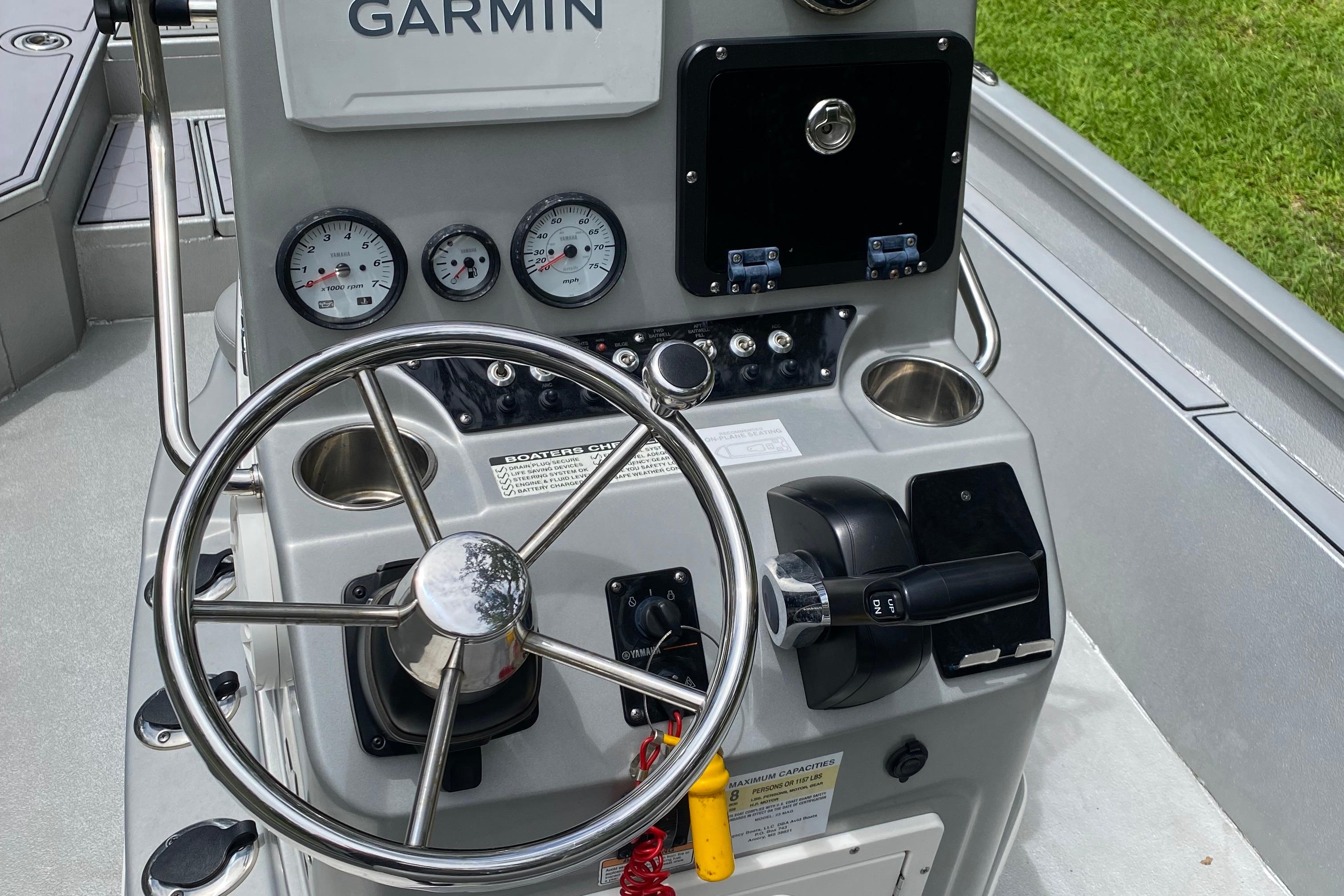 Control panel of 2021 Avid 23 FS Magnum boat with Garmin navigation system.