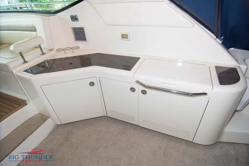  Yacht Photos Pics Interior of 2013 Sea Ray 540 Sundancer yacht with white cabinetry and countertop.