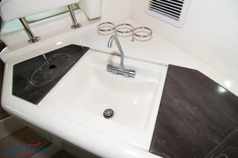  Yacht Photos Pics Sea Ray 540 Sundancer 2013 yacht sink with faucet and countertop.