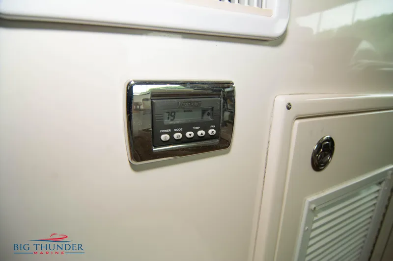 Yacht Photos Pics Control panel on 2013 Sea Ray 540 Sundancer yacht, Big Thunder Marine logo.