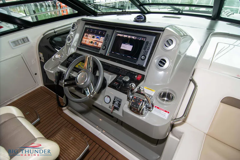  Yacht Photos Pics 2013 Sea Ray 540 Sundancer helm with advanced navigation system.