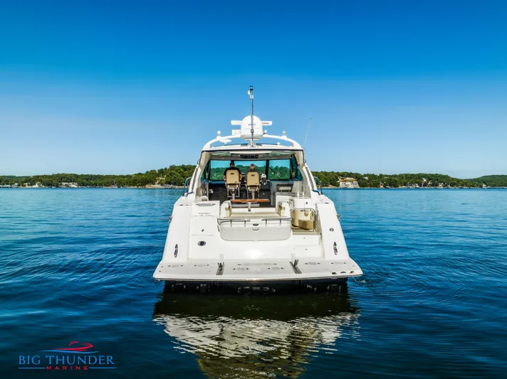  Yacht Photos Pics 2013 Sea Ray 540 Sundancer yacht on calm water, rear view.