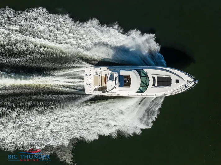  Yacht Photos Pics Aerial view of 2013 Sea Ray 540 Sundancer yacht cruising on water.