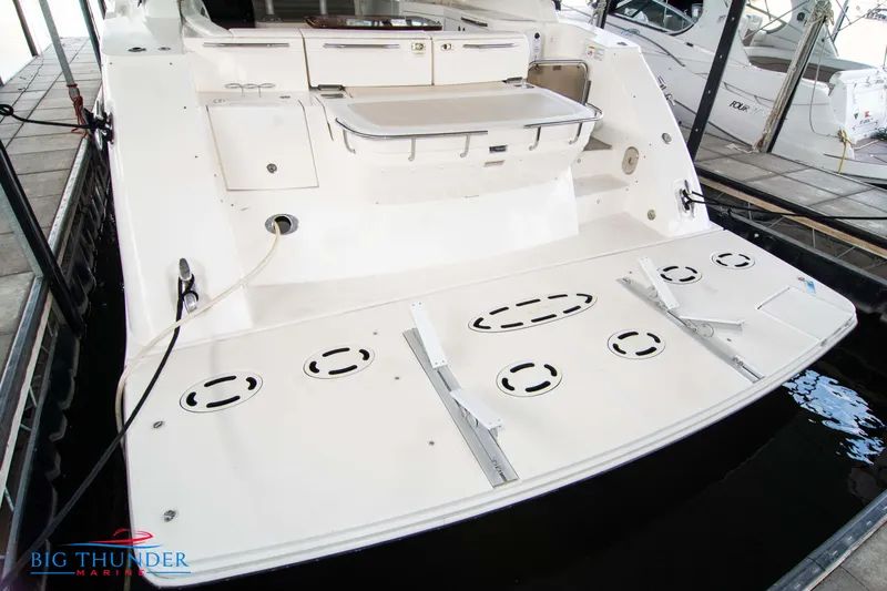  Yacht Photos Pics 2013 Sea Ray 540 Sundancer yacht stern view in marina.