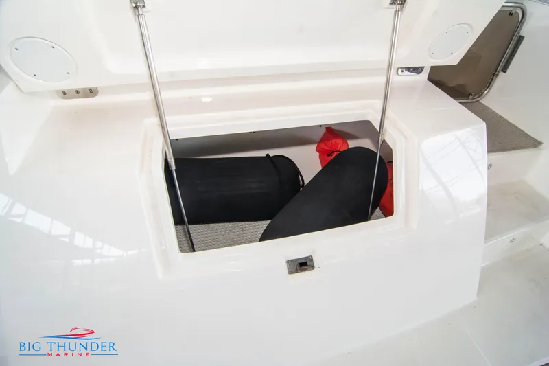  Yacht Photos Pics 2013 Sea Ray 540 Sundancer storage compartment with gear and equipment.