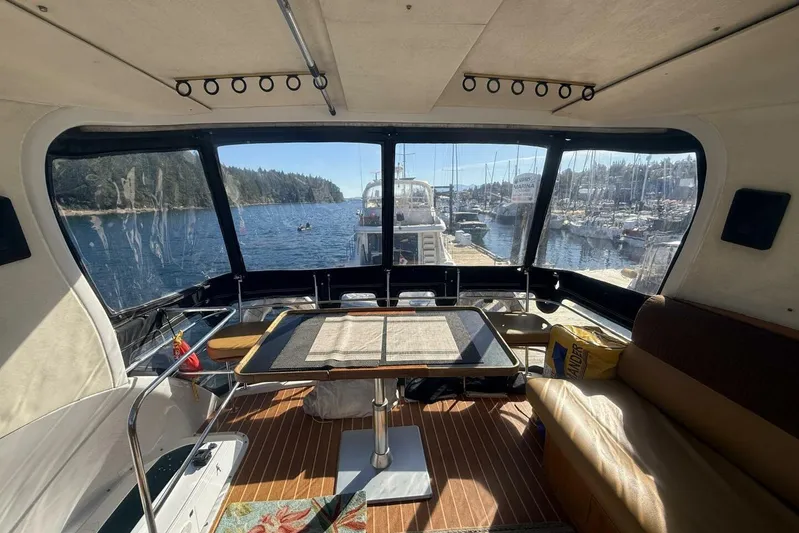  Yacht Photos Pics Interior view of 2000 Royal Pacific 476 Sport Cruiser docked at scenic marina.