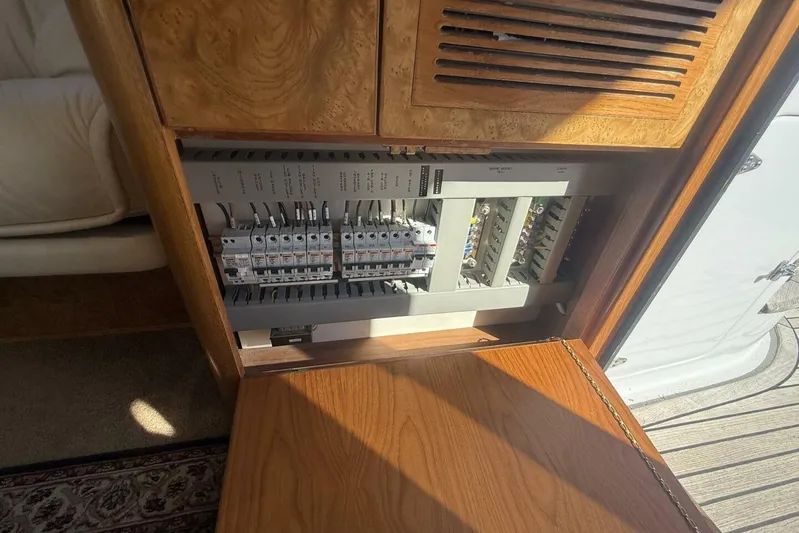  Yacht Photos Pics Electrical panel inside 2000 Royal Pacific 476 Sport Cruiser yacht, showcasing circuit breakers.