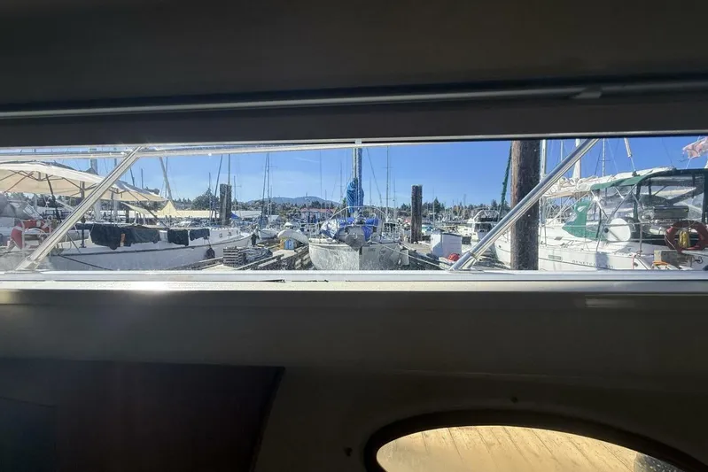  Yacht Photos Pics View from Royal Pacific 476 Sport Cruiser, 2000, overlooking marina with sailboats and clear sky.