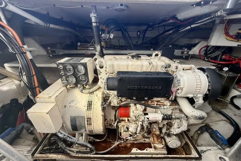  Yacht Photos Pics Engine compartment of a 2000 Royal Pacific 476 Sport Cruiser with Westerbeke generator.