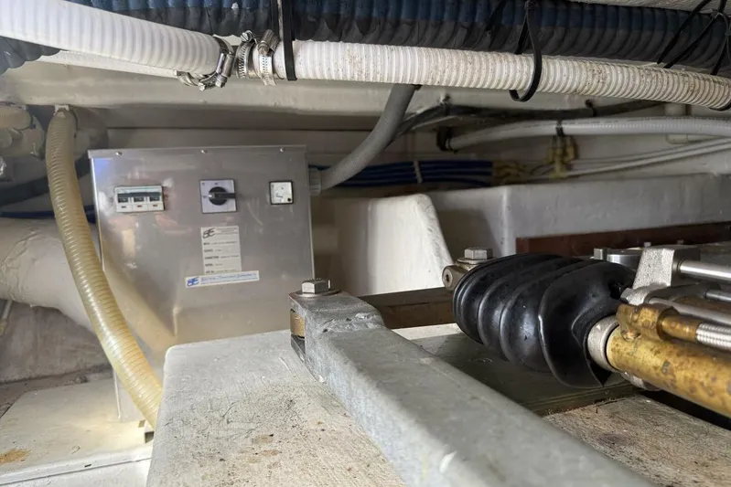  Yacht Photos Pics Engine room of 2000 Royal Pacific 476 Sport Cruiser with mechanical components and wiring.