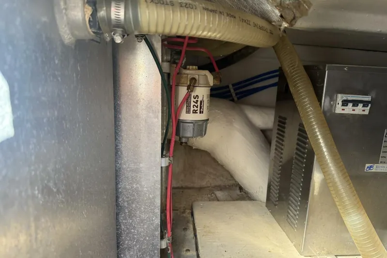  Yacht Photos Pics Engine compartment of a 2000 Royal Pacific 476 Sport Cruiser, showing wiring and components.