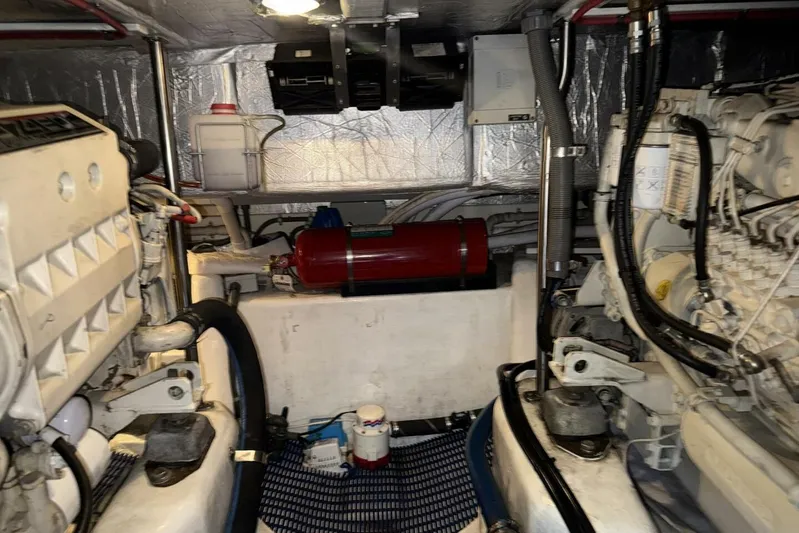  Yacht Photos Pics Engine room of 2000 Royal Pacific 476 Sport Cruiser with visible machinery and equipment.