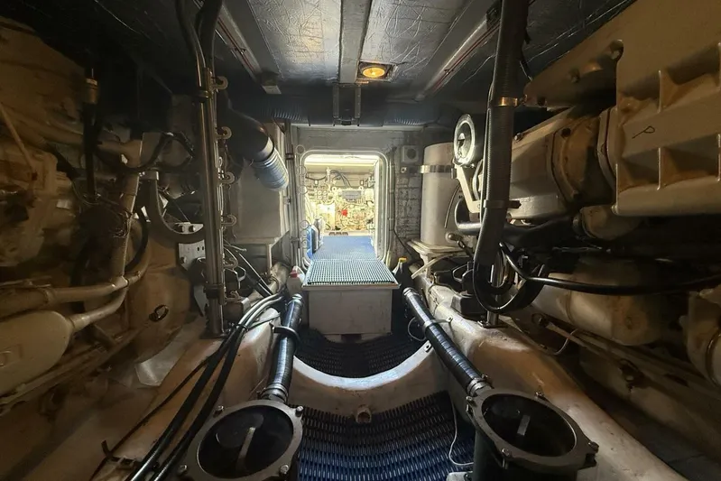  Yacht Photos Pics Engine room of 2000 Royal Pacific 476 Sport Cruiser, showcasing mechanical components and layout.