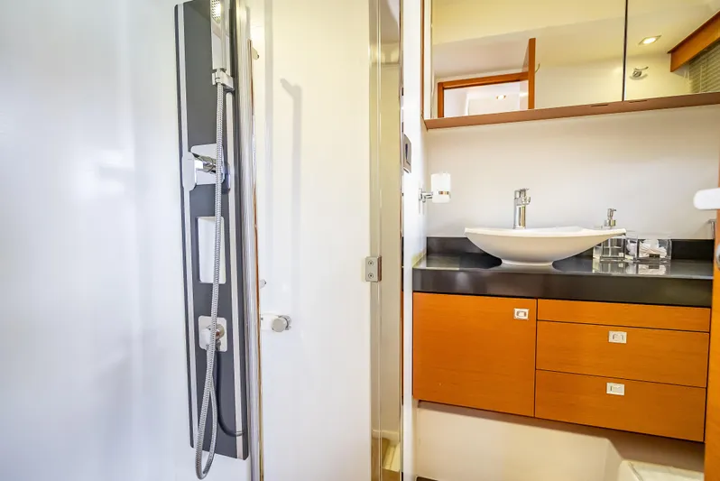 Miss Zoe Yacht Photos Pics Luxurious bathroom in 2014 Prestige 500 Fly yacht with modern fixtures.