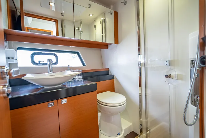 Miss Zoe Yacht Photos Pics Luxurious bathroom in 2014 Prestige 500 Fly yacht with modern fixtures and elegant design.