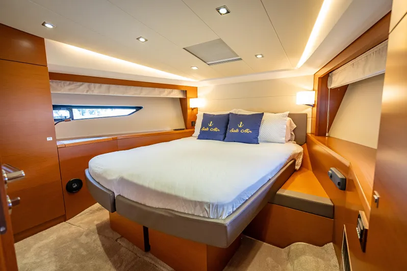 Miss Zoe Yacht Photos Pics Luxurious cabin interior of 2014 Prestige 500 Fly yacht with cozy bed and modern lighting.