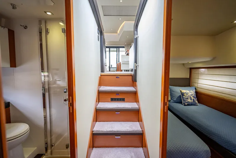 Miss Zoe Yacht Photos Pics Interior of 2014 Prestige 500 Fly yacht, featuring stairs, bedroom, and bathroom.