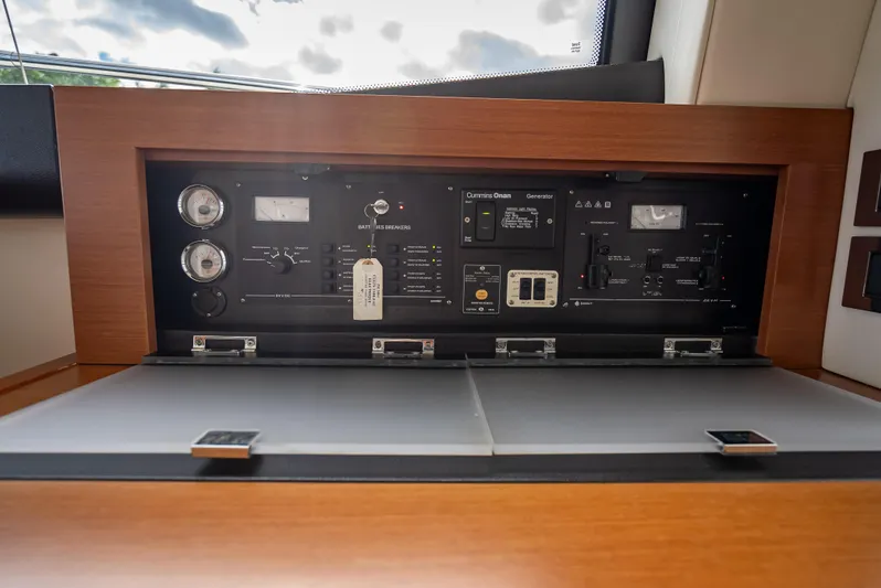 Miss Zoe Yacht Photos Pics Control panel of 2014 Prestige 500 Fly yacht with gauges and switches.