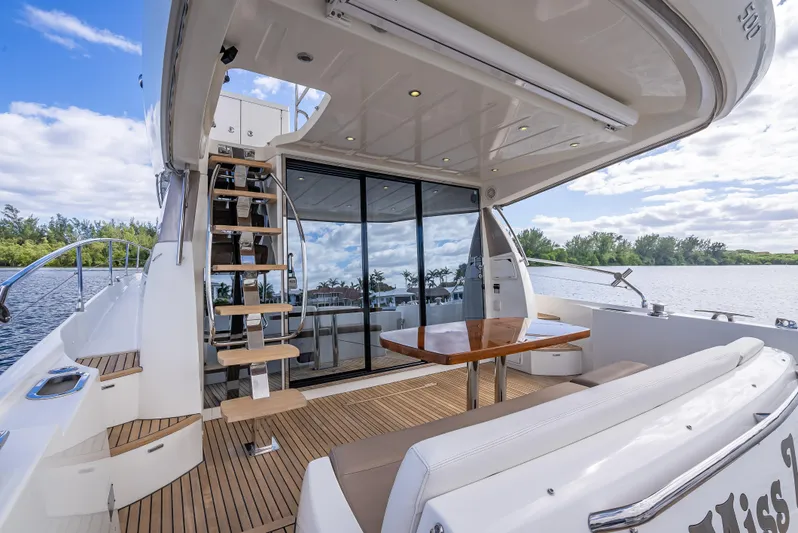 Miss Zoe Yacht Photos Pics Luxurious 2014 Prestige 500 Fly yacht with spacious deck and elegant seating area.