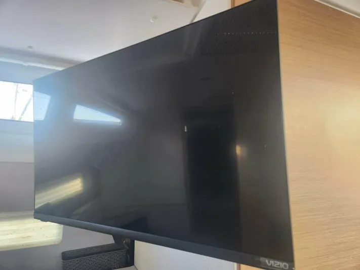 Fred's Dream Yacht Photos Pics Flat-screen Vizio TV inside 2020 Jeanneau Sun Odyssey 410 yacht interior.