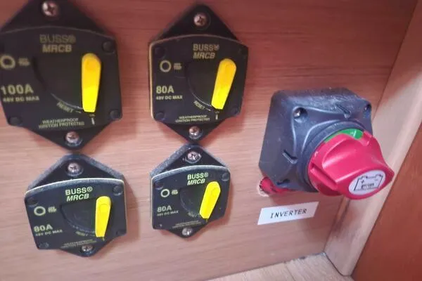 Fred's Dream Yacht Photos Pics Electrical panel with circuit breakers and inverter switch on Jeanneau Sun Odyssey 410, 2020 model.