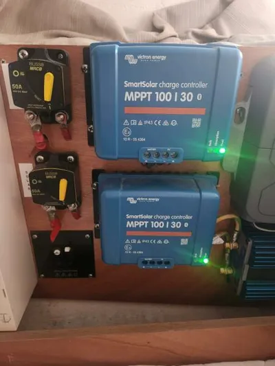 Fred's Dream Yacht Photos Pics SmartSolar charge controllers on Jeanneau Sun Odyssey 410, 2020 model, with electrical setup.