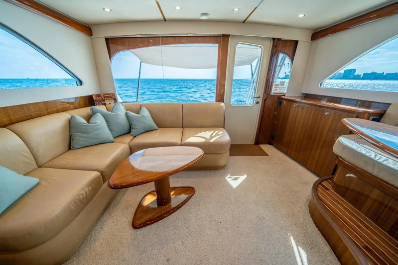 Ring Game Yacht Photos Pics Luxurious interior of 2008 Viking 42 Convertible yacht with ocean view.