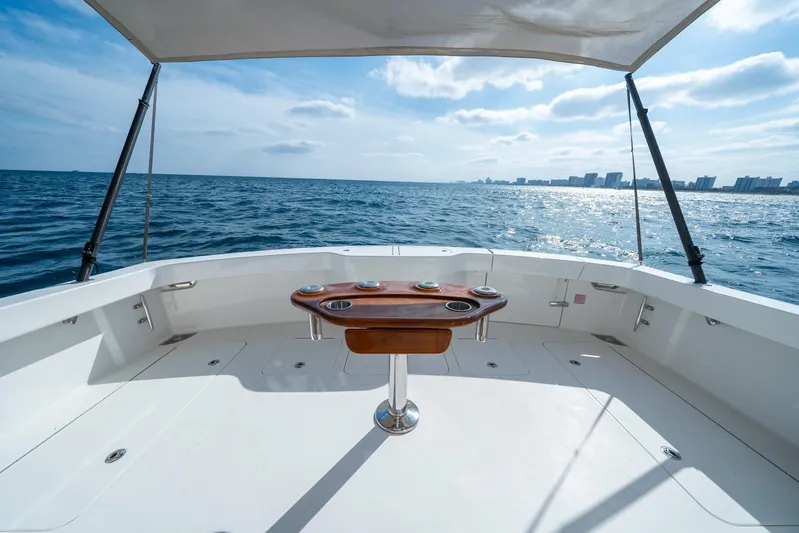 Ring Game Yacht Photos Pics 2008 Viking 42 Convertible yacht deck with ocean view and city skyline.