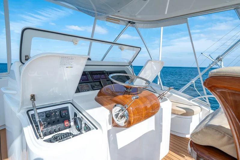 Ring Game Yacht Photos Pics Helm of 2008 Viking 42 Convertible yacht with ocean view.