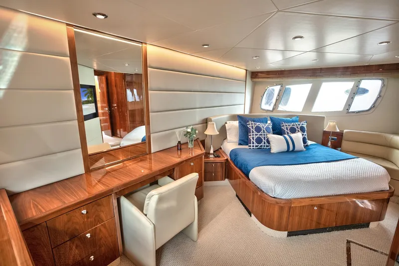 Azzurro Yacht Photos Pics Luxurious cabin interior of 2009 Sunseeker Manhattan 70 yacht with elegant furnishings.
