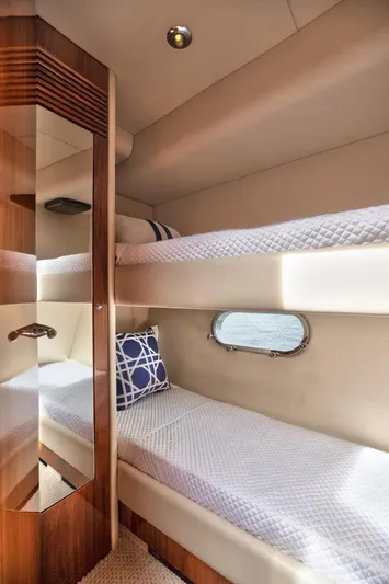 Azzurro Yacht Photos Pics 2009 Sunseeker Manhattan 70 yacht cabin with bunk beds and porthole.