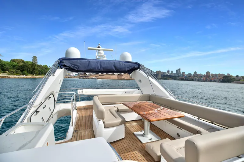 Azzurro Yacht Photos Pics Luxurious 2009 Sunseeker Manhattan 70 yacht with spacious deck and scenic waterfront view.