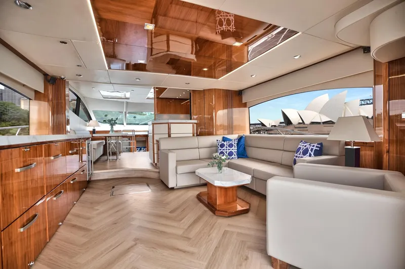 Azzurro Yacht Photos Pics Luxurious interior of 2009 Sunseeker Manhattan 70 yacht with elegant wood finishes.