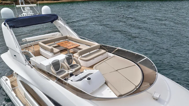 Azzurro Yacht Photos Pics Luxurious 2009 Sunseeker Manhattan 70 yacht with spacious deck and seating area.