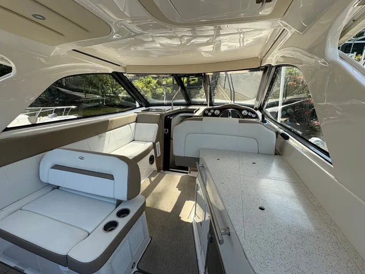 Wining Down Yacht Photos Pics Interior of 2016 Regal 35 Sport Coupe, featuring sleek seating and modern design.
