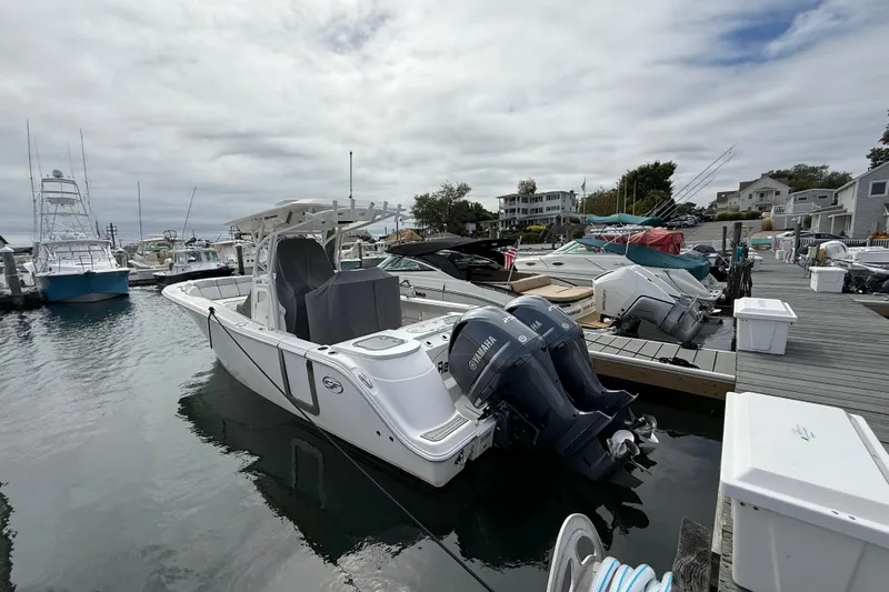  Yacht Photos Pics 2021 Sea Fox 288 Commander boat docked at a marina with twin Yamaha engines.
