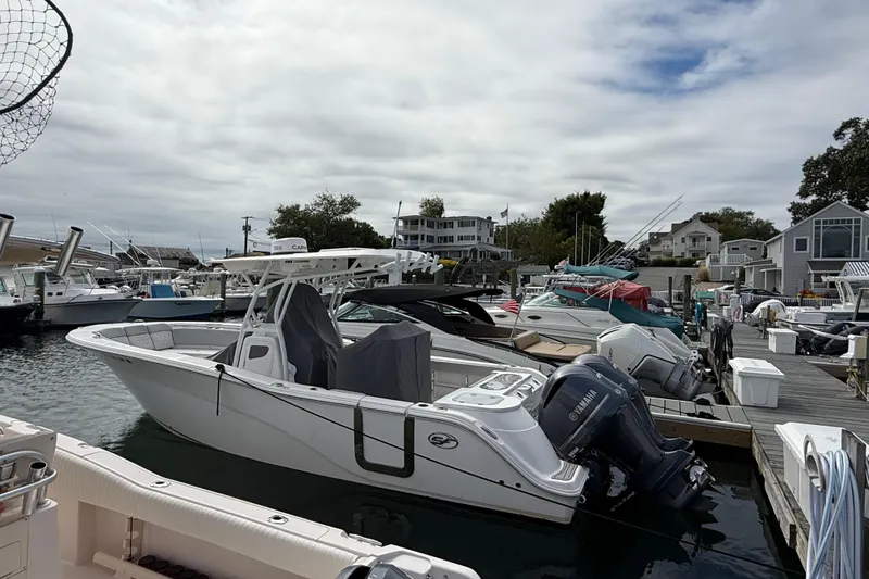 Yacht Photos Pics 2021 Sea Fox 288 Commander boat docked at a marina with Yamaha engines.
