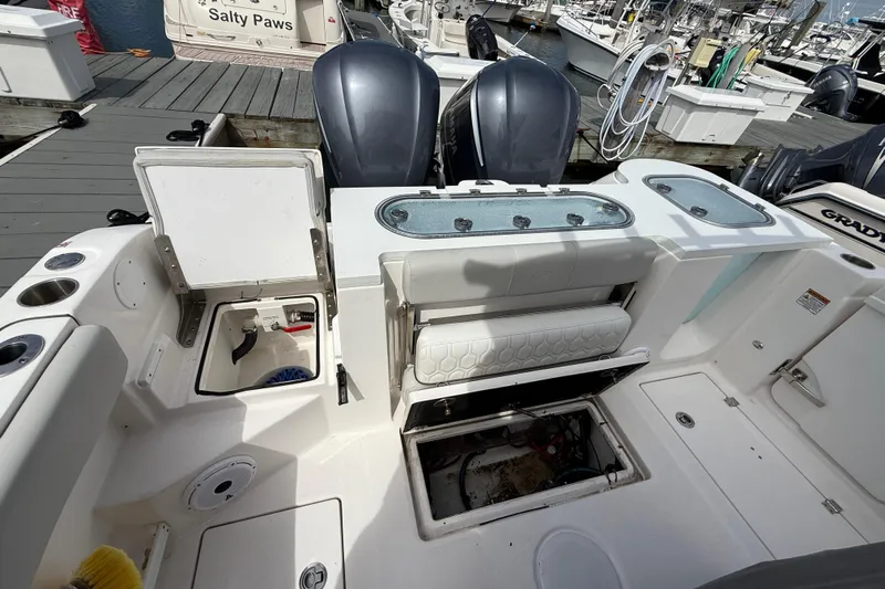  Yacht Photos Pics 2021 Sea Fox 288 Commander boat interior with open storage compartments at dock.