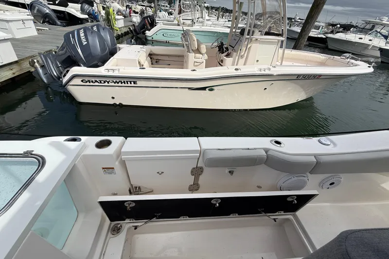  Yacht Photos Pics 2021 Sea Fox 288 Commander docked, with Grady-White boat nearby in marina.