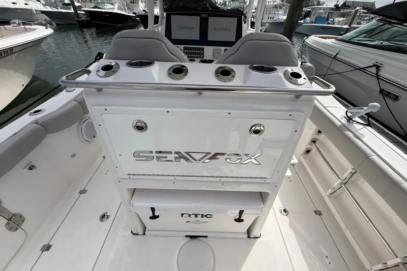  Yacht Photos Pics 2021 Sea Fox 288 Commander boat interior with rod holders and Garmin electronics.