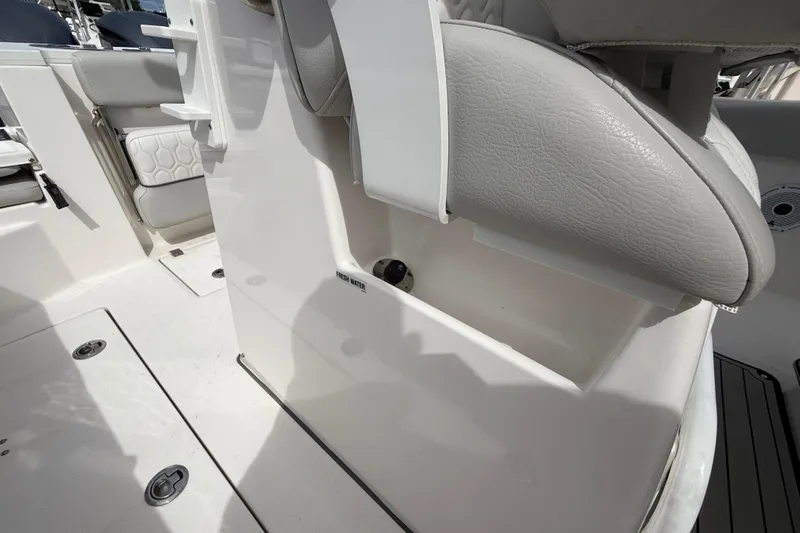  Yacht Photos Pics 2021 Sea Fox 288 Commander boat interior with seating and storage compartment.