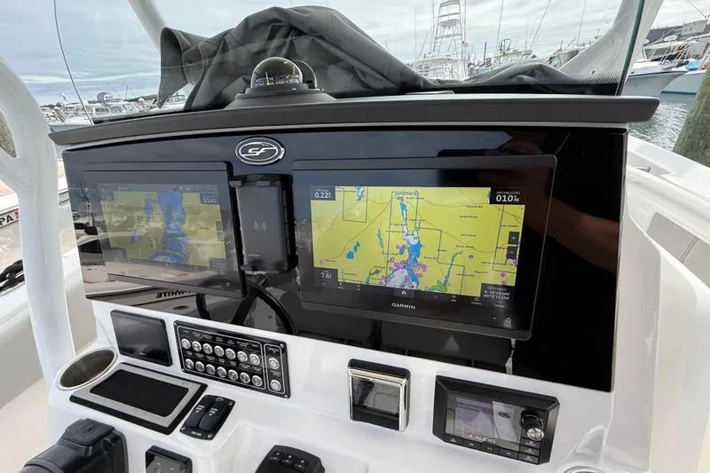  Yacht Photos Pics 2021 Sea Fox 288 Commander dashboard with dual Garmin navigation displays at marina.