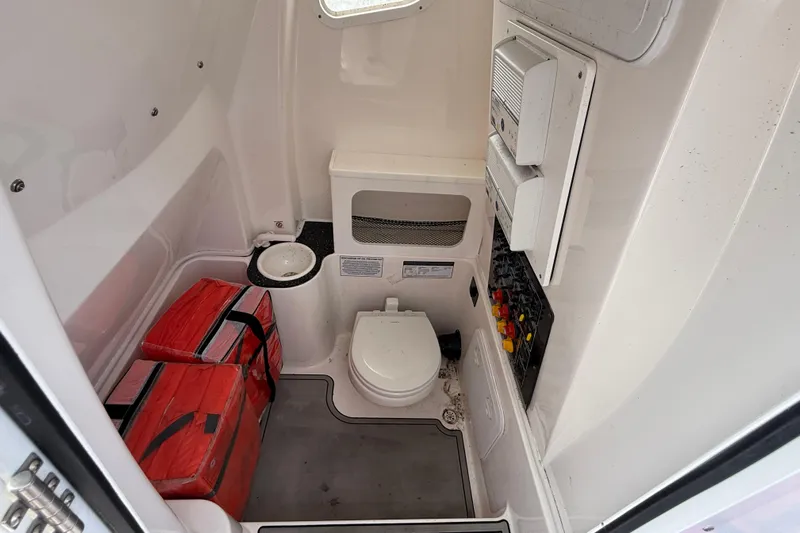  Yacht Photos Pics Interior of 2021 Sea Fox 288 Commander boat with toilet and storage.