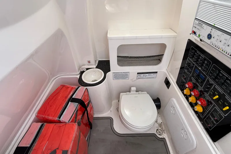  Yacht Photos Pics Interior of 2021 Sea Fox 288 Commander boat with toilet and control panel.