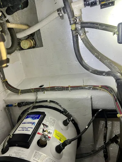 Arvo Arrow Yacht Photos Pics Engine room of 1985 Chris-Craft 460 Constellation with visible wiring and components.