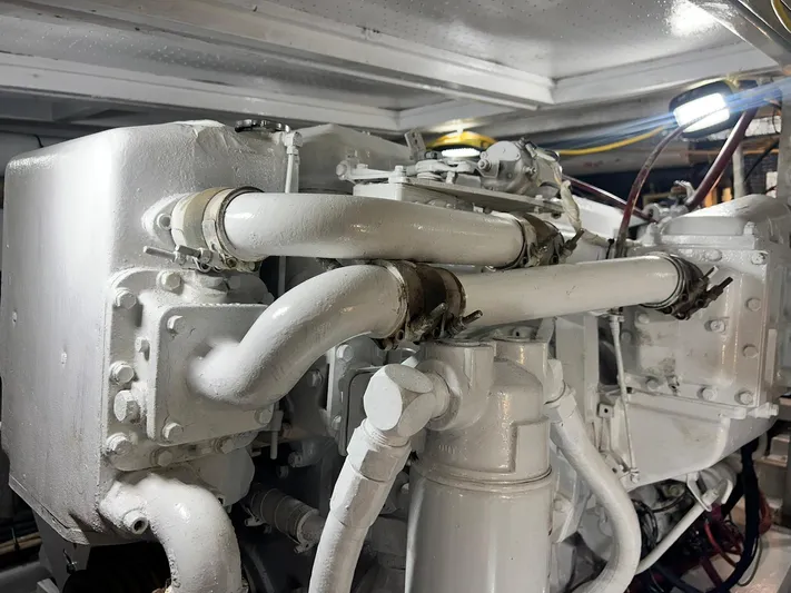 Arvo Arrow Yacht Photos Pics Engine room of a 1985 Chris-Craft 460 Constellation yacht, showcasing mechanical components.