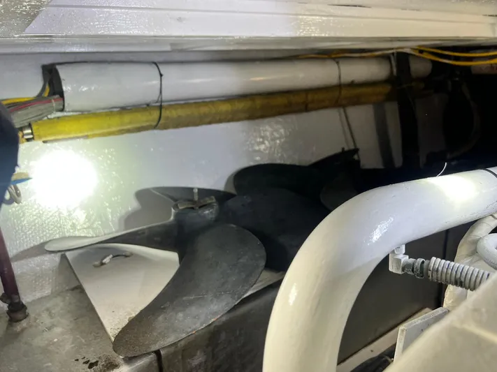 Arvo Arrow Yacht Photos Pics Engine room of 1985 Chris-Craft 460 Constellation with visible propeller and pipes.