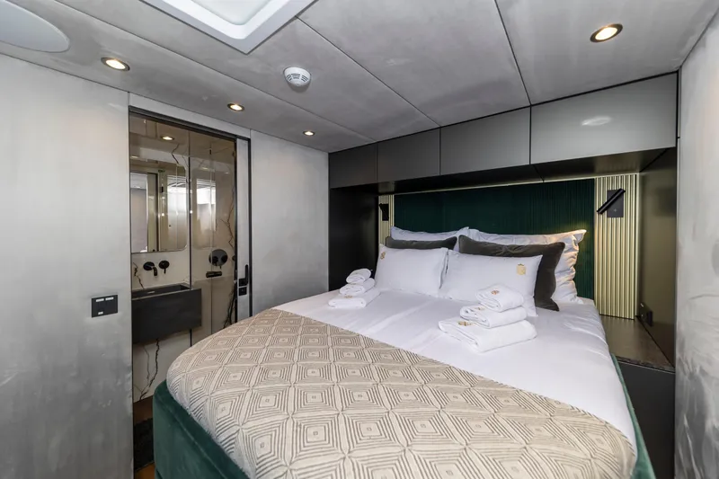 Mr.si Yacht Photos Pics Luxurious bedroom interior of 2023 Sunreef 60 Sailing yacht with modern design.