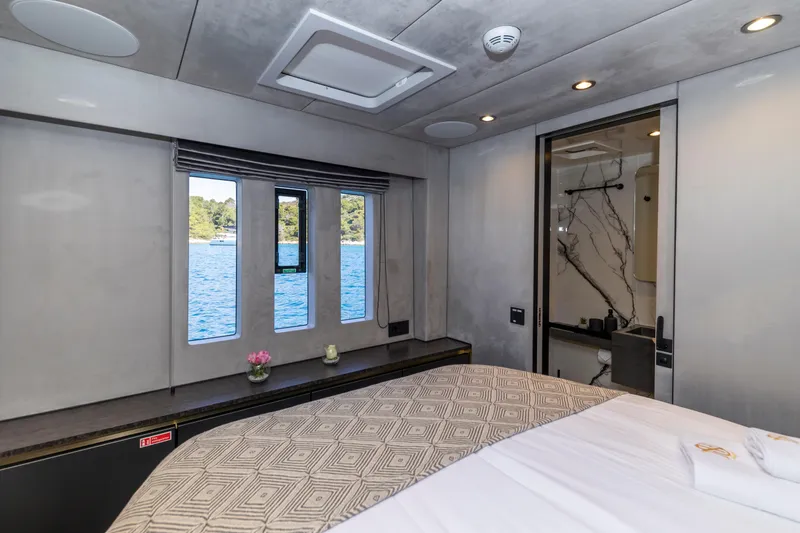 Mr.si Yacht Photos Pics Luxurious cabin interior of 2023 Sunreef 60 Sailing yacht with ocean view.