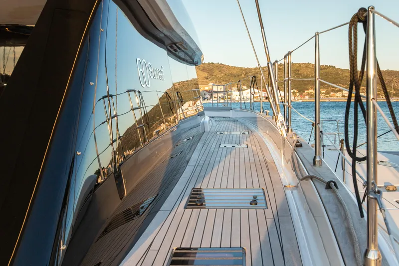Mr.si Yacht Photos Pics 2023 Sunreef 60 Sailing yacht deck with sleek design and ocean view.